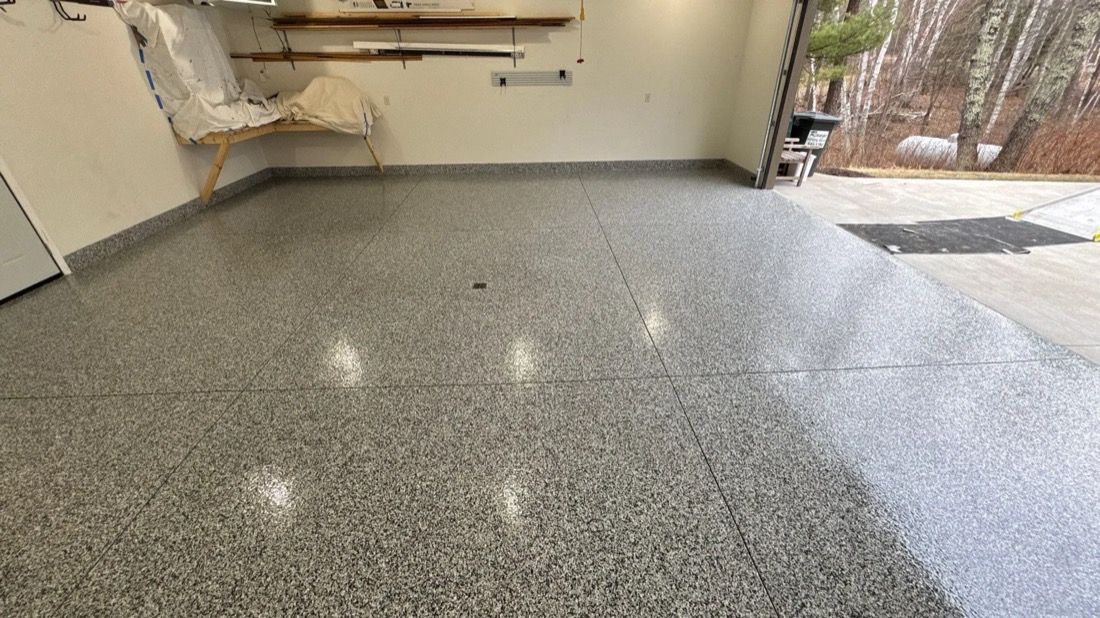 Finished flake garage floor with the door open